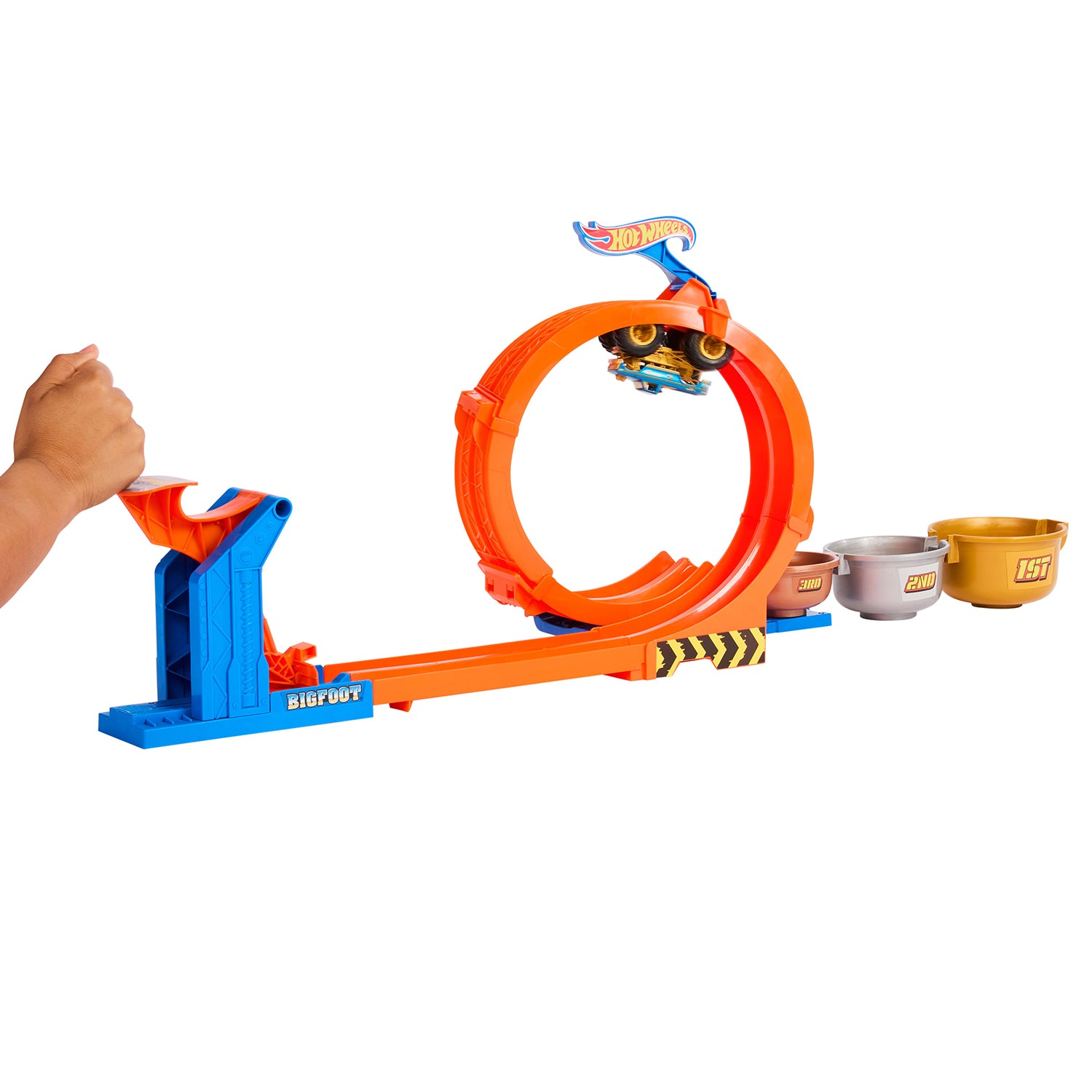 MATTEL - Hot Wheels Monster Trucks Sfida Trofeo Gira e Capovolgi 2 in 1 con Bigfoot 50° Anniversario 4+ Anni