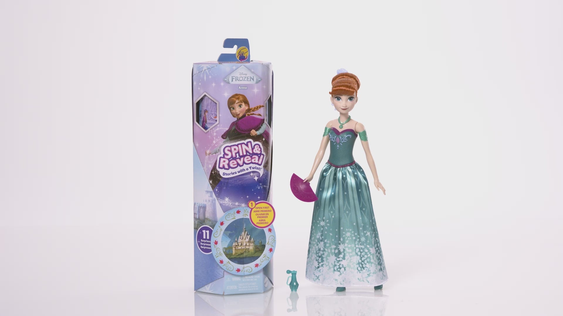 MATTEL - Disney Frozen Spin & Reveal Anna Bambola con 11 Sorprese e Accessori