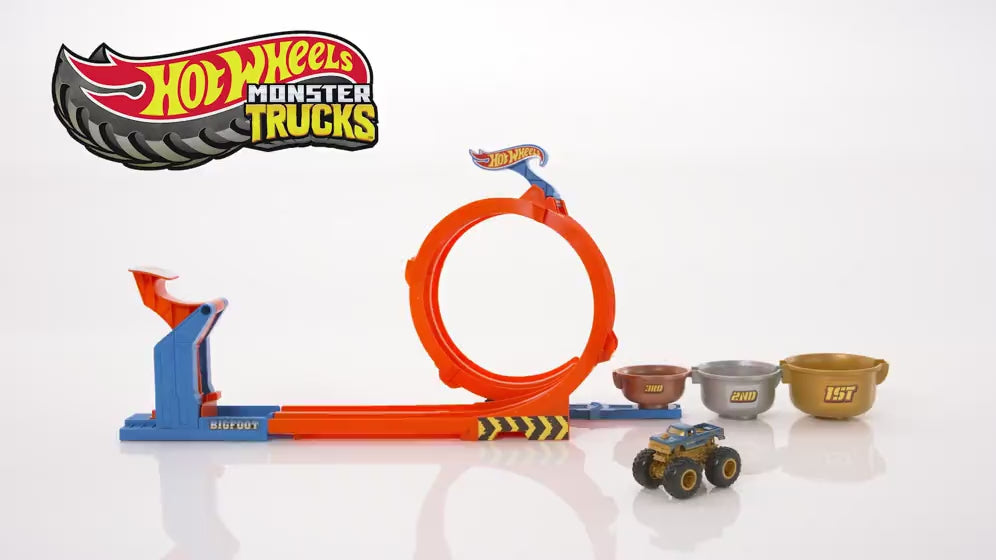 MATTEL - Hot Wheels Monster Trucks Sfida Trofeo Gira e Capovolgi 2 in 1 con Bigfoot 50° Anniversario 4+ Anni