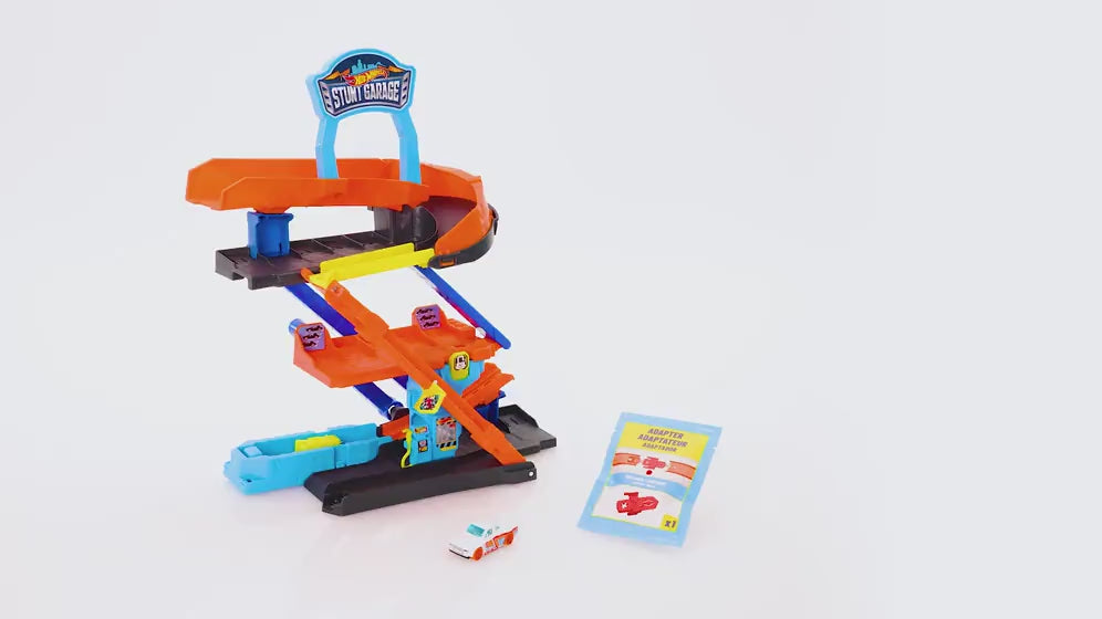 MATTEL - Hot Wheels City Transforming Stunt Garage 2 in 1 con Pista Acrobazie e Macchinina 1:64 4+ Anni