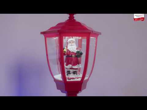 VESTIAMO CASA GRAN NATALE - Lampione Natalizio Luminoso Babbo Natale con Effetto Neve e Musica - h150x30x30 cm